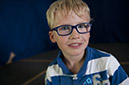 %_tempFileNameboy-with-glasses%