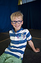 %_tempFileNameboy-with-striped-shirt%