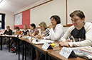 %_tempFileNameadults-in-class%