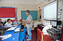 %_tempFileNameteacher-with-adults%