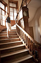 %_tempFileNameteignmouth-residence-stairs-with-clock%
