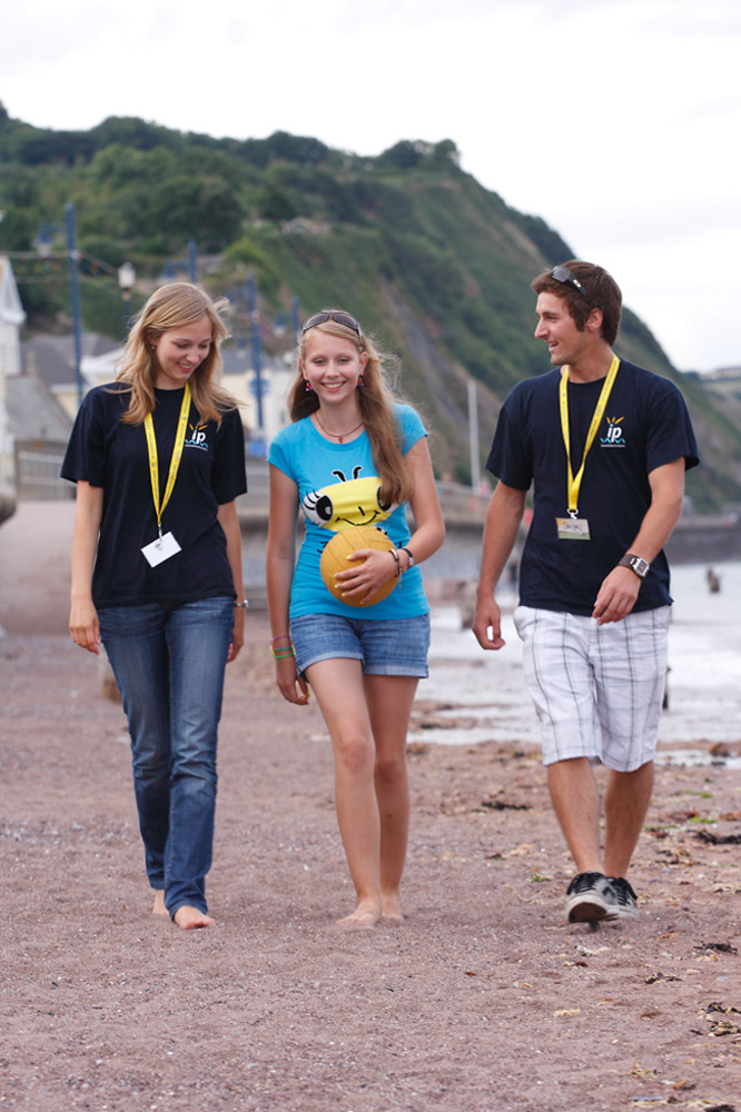 %_tempFileNamegirl-with-staff-at-the-beach-9%