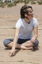 %_tempFileNamegirl-is-sitting-at-beach%