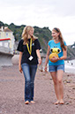 %_tempFileNamegirl-with-staff-at-the-beach-13%