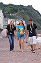 %_tempFileNamegirl-with-staff-at-the-beach-3%