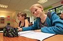 %_tempFileNamegirls-attending-to-class%