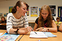 %_tempFileNamegirls-in-class-1%