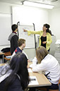 %_tempFileNameteacher-next-to-the-sheet_3%
