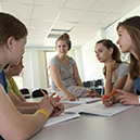 %_tempFileNameteacher-with-students-3%