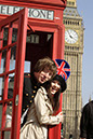 %_tempFileNamecouple-in-telephone-cabin%