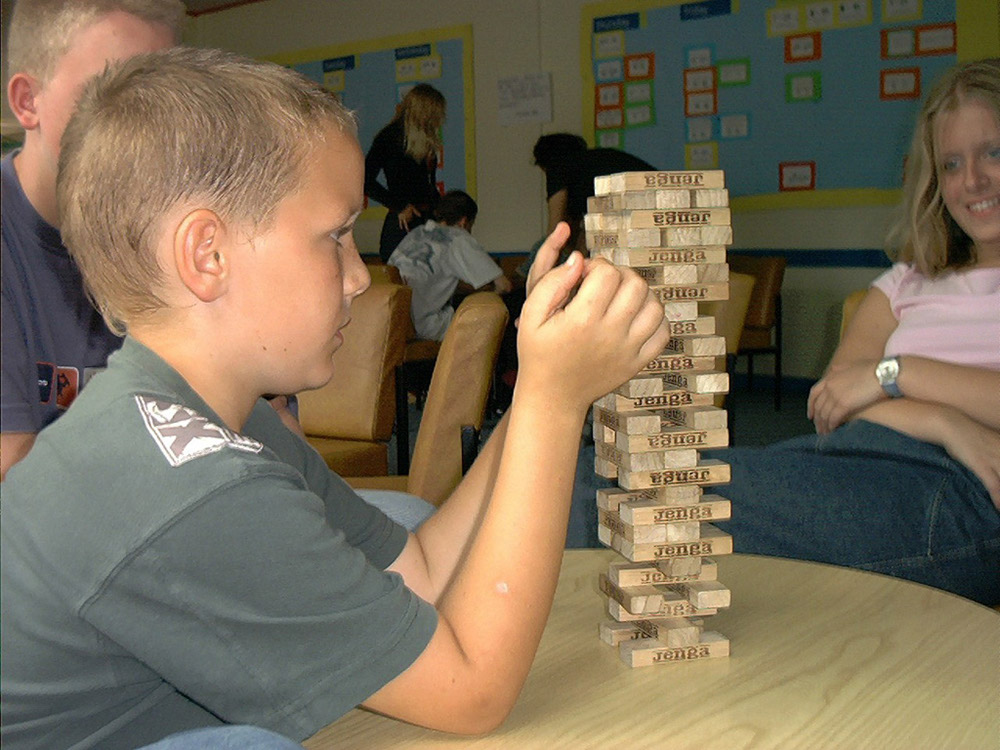 %_tempFileNameboy-playing-Jenga%