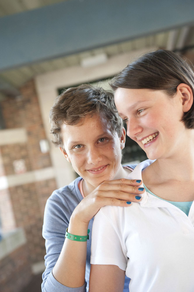 %_tempFileNametwo-girls-smiling%20(1)%