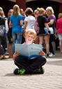 %_tempFileNameblonde-boy-with-ip-folder-2%