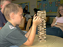 %_tempFileNameboy-playing-Jenga%