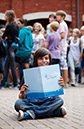 %_tempFileNamedark-haired-boy-with-ip-folder-1%