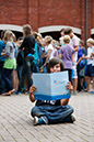 %_tempFileNamedark-haired-boy-with-ip-folder-2%