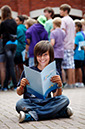 %_tempFileNamedark-haired-boy-with-ip-folder-3%
