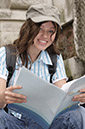 %_tempFileNamegirl-with-newspaper%