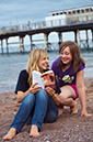 %_tempFileNamereading-on-beach%