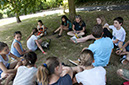 %_tempFileNamesitting-group-of-students-2%