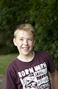 %_tempFileNamesmiling-boy%
