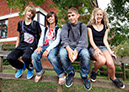 %_tempFileNamestudents-sitting-on-bannister-1%