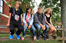 %_tempFileNamestudents-sitting-on-bannister-10%