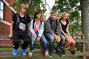%_tempFileNamestudents-sitting-on-bannister-3%
