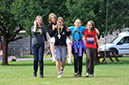 %_tempFileNamewalking-girls-with-staff-3%