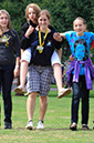 %_tempFileNamewalking-girls-with-staff-5%