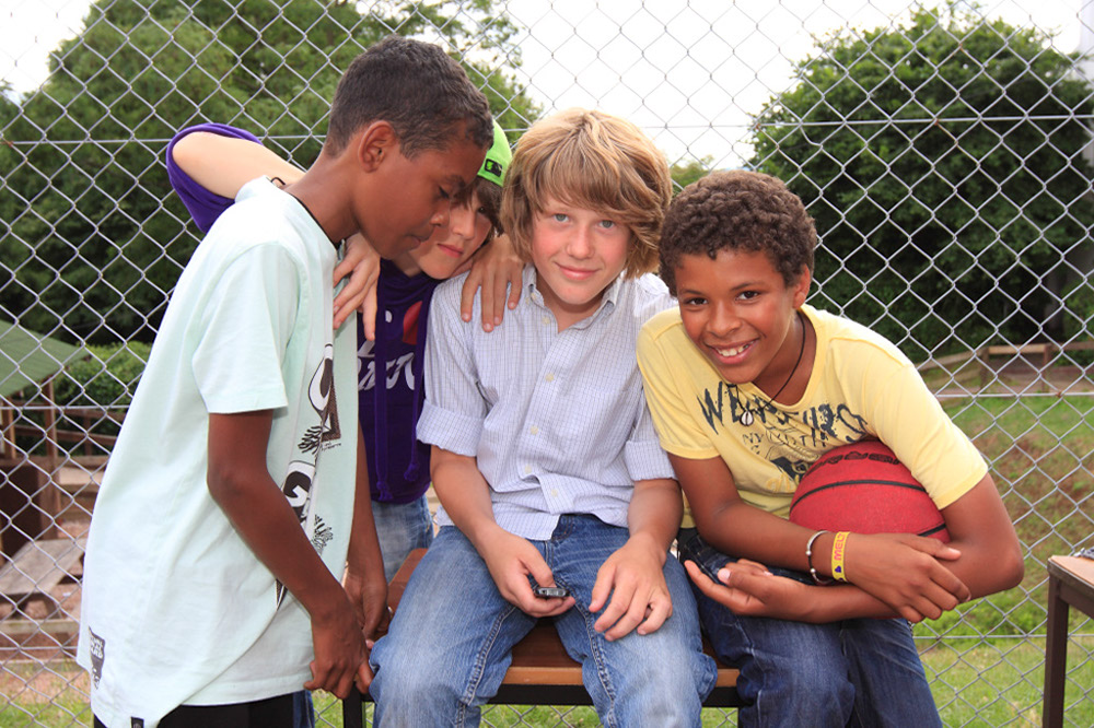 %_tempFileNamefour-boys-with-basketball-2%