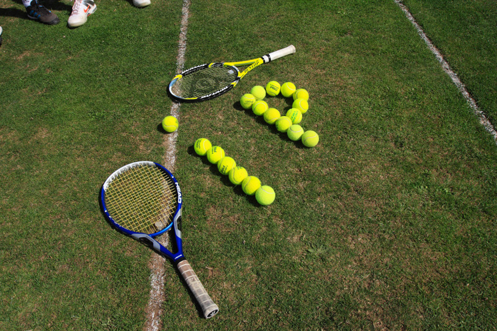 %_tempFileNameip-sign-made-of-tennis-balls-2%