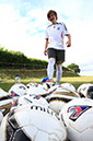 %_tempFileNameboy-with-many-footballs-1%