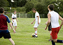 %_tempFileNameplaying-football-3%