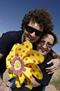 %_tempFileNamestaff-with-flower-2%