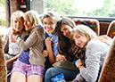 %_tempFileNamegroup-girls-in-bus%